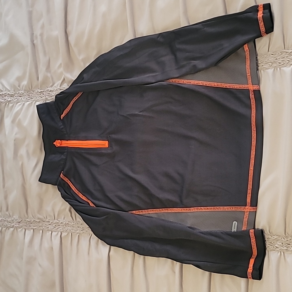 Kids size 7 gray and orange long sleeve tee shirt.